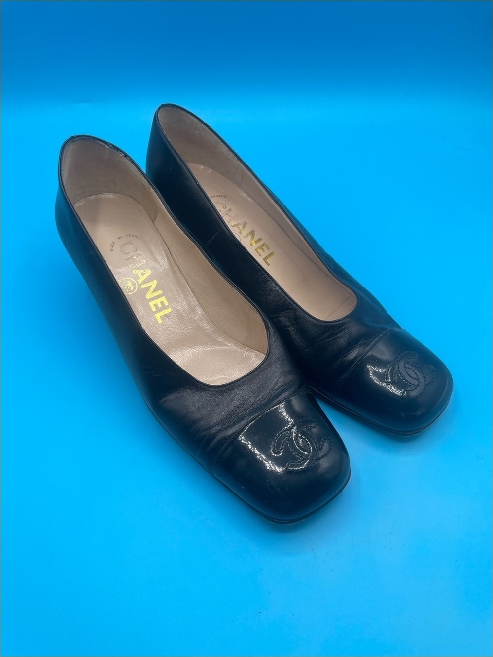 Vintage Chanel black leather pumps